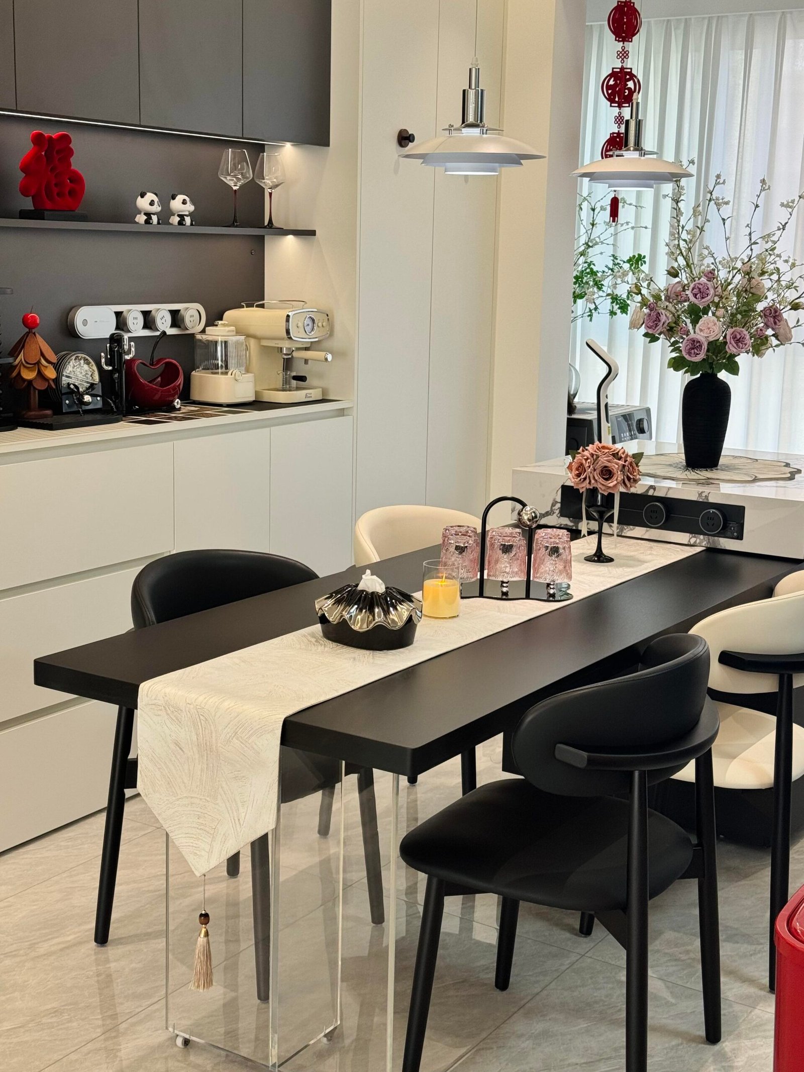 Modern Dining Table for 4 with cream upholstered chairs and marble flooring