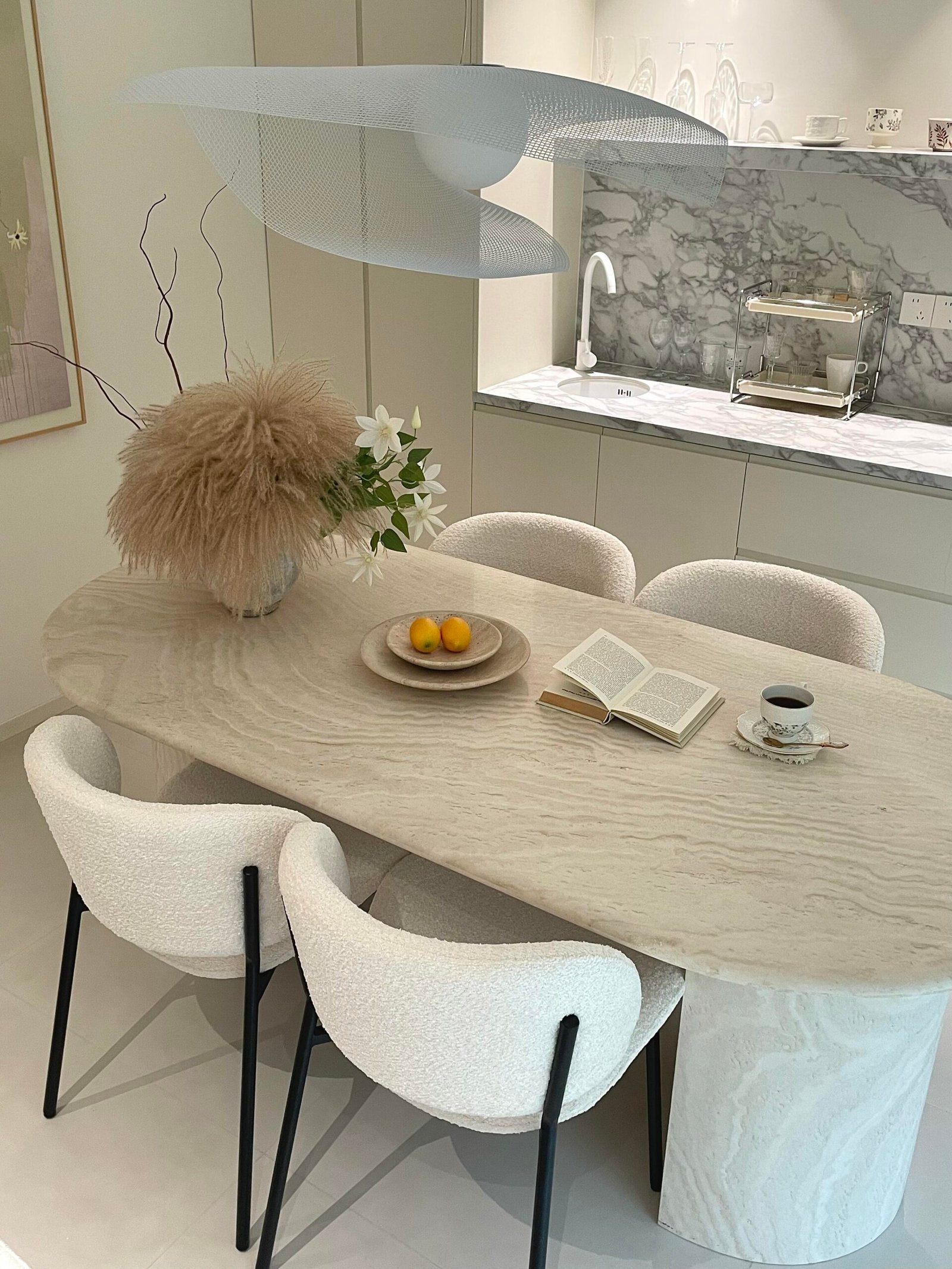 Soft modern dining room featuring a Dining Table Set for 4 and marble finishes.
