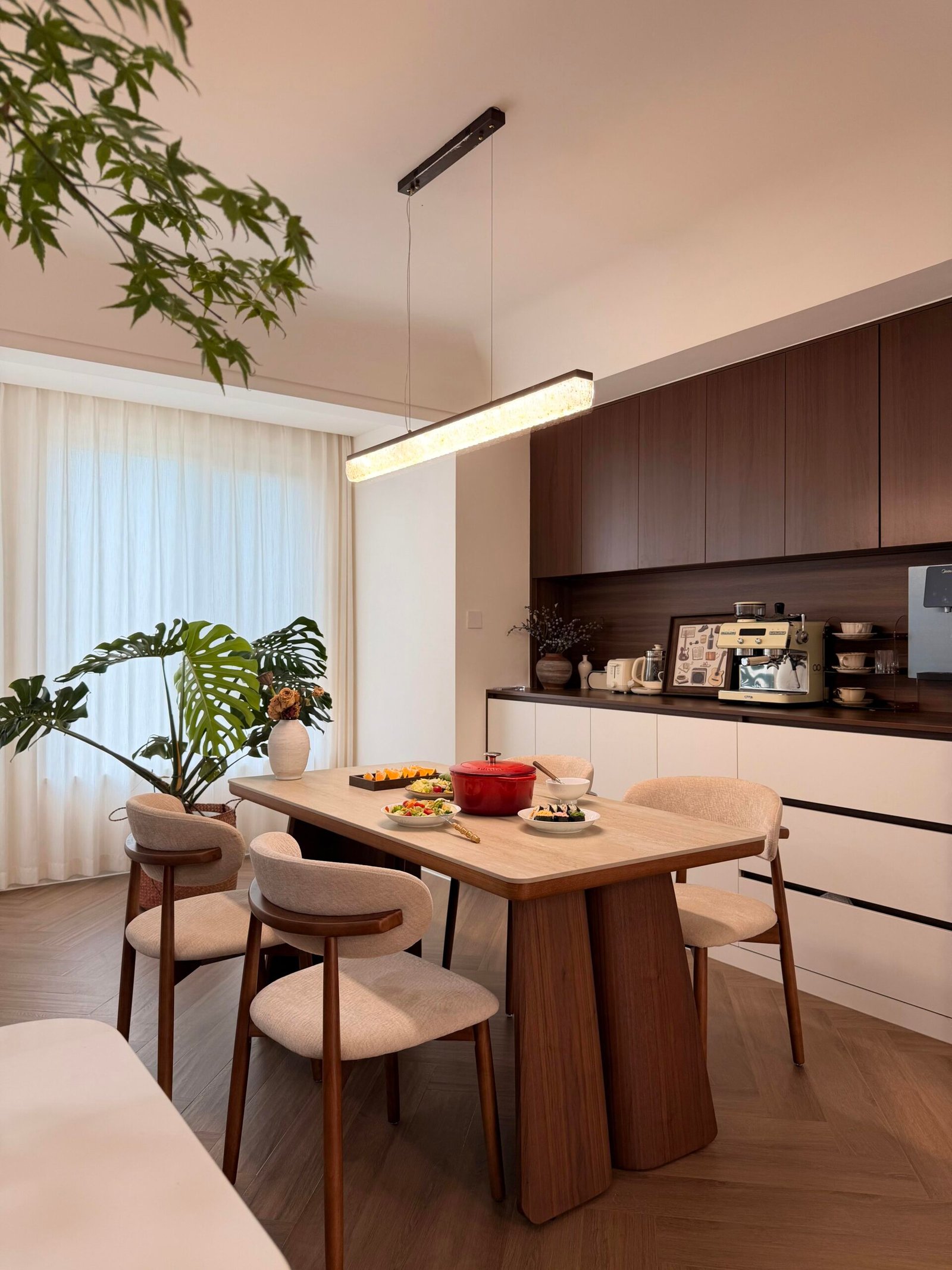 Modern Dining Table Set for 4 with walnut wood table and upholstered chairs.