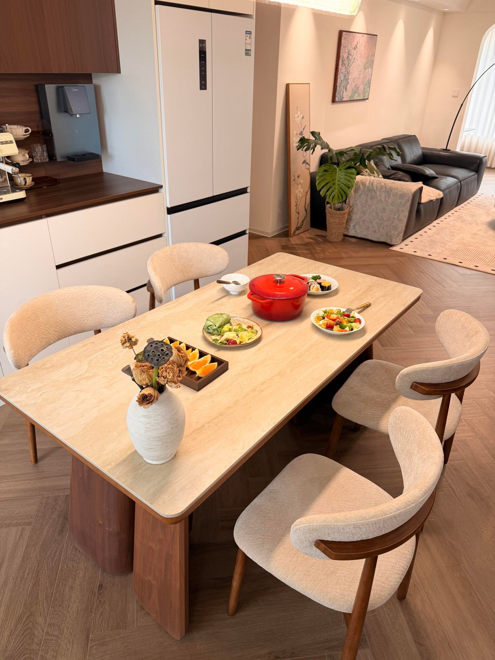 Warm wood dining room featuring a Dining Table Set for 4 and pendant lighting.