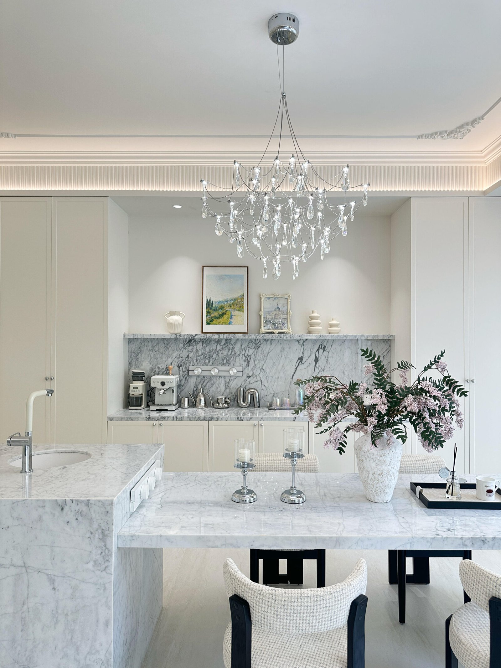Luxury dining area with a Modern Dining Table for 4 and floral centerpiece