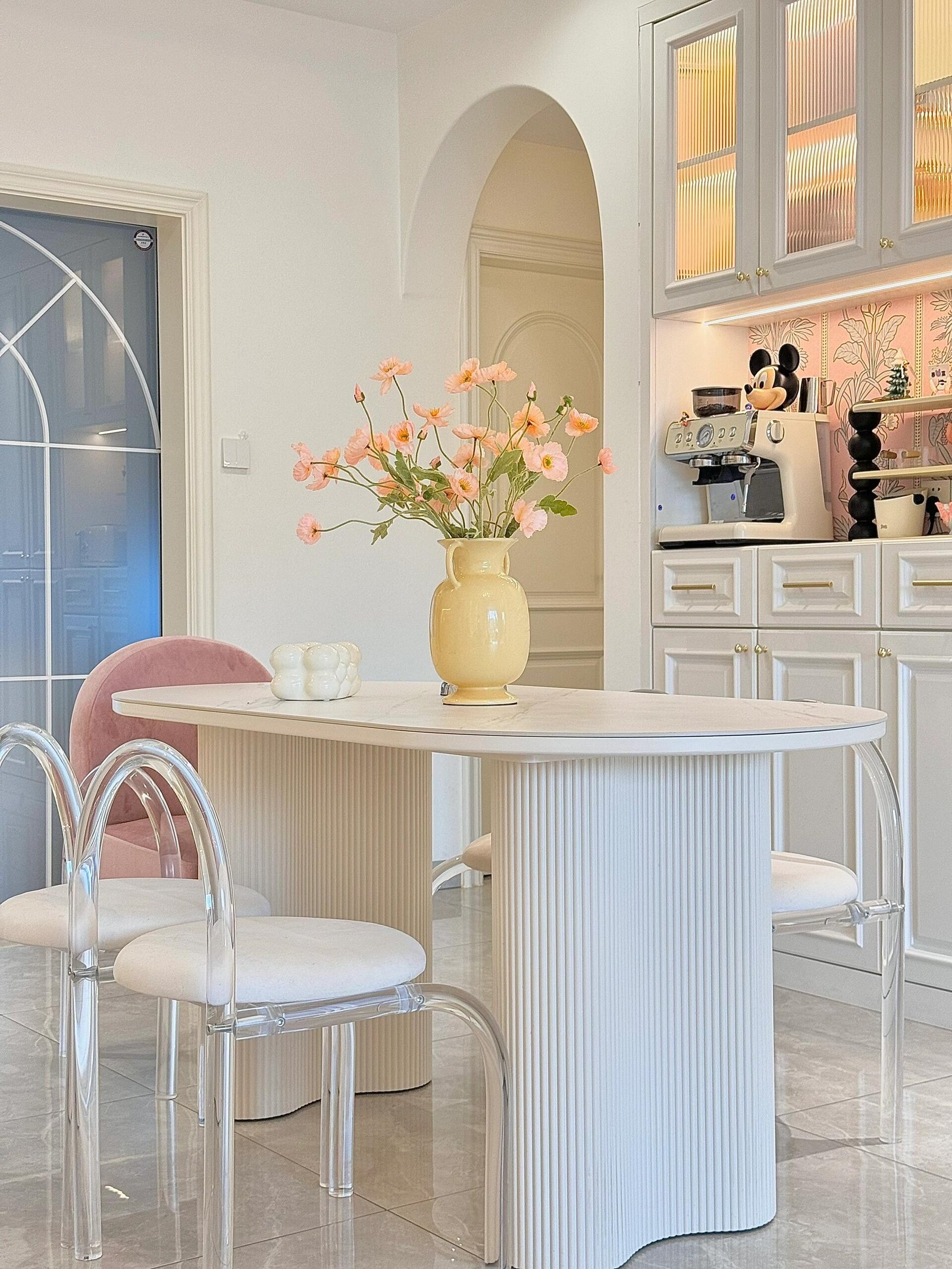 Bright luxury interior with marble surfaces and layered ambient lighting