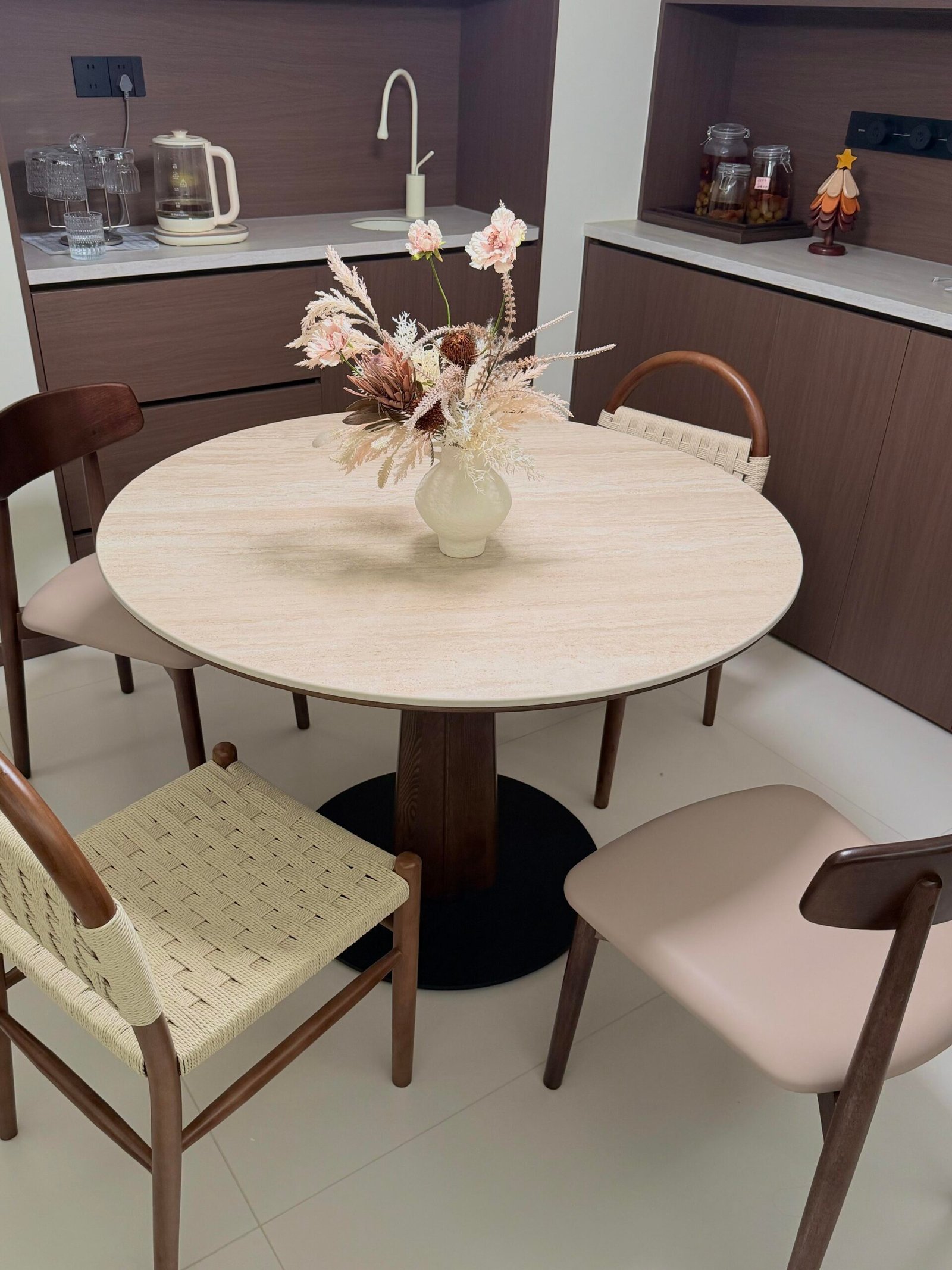 Cozy modern dining nook featuring a Dining Table Set for 4 and pendant light.