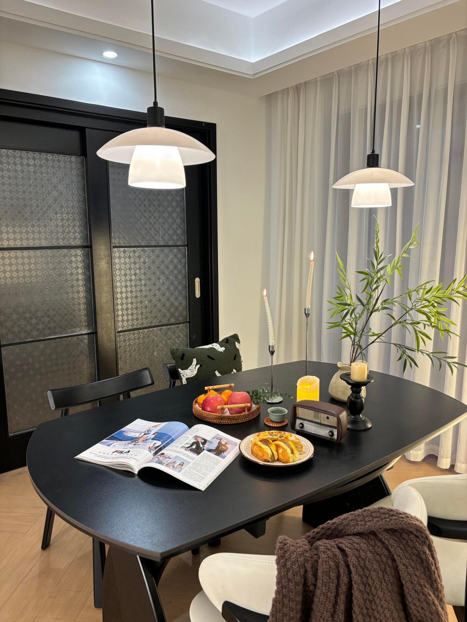 Modern Dining Table for 4 paired with neutral artwork and subtle gold decor