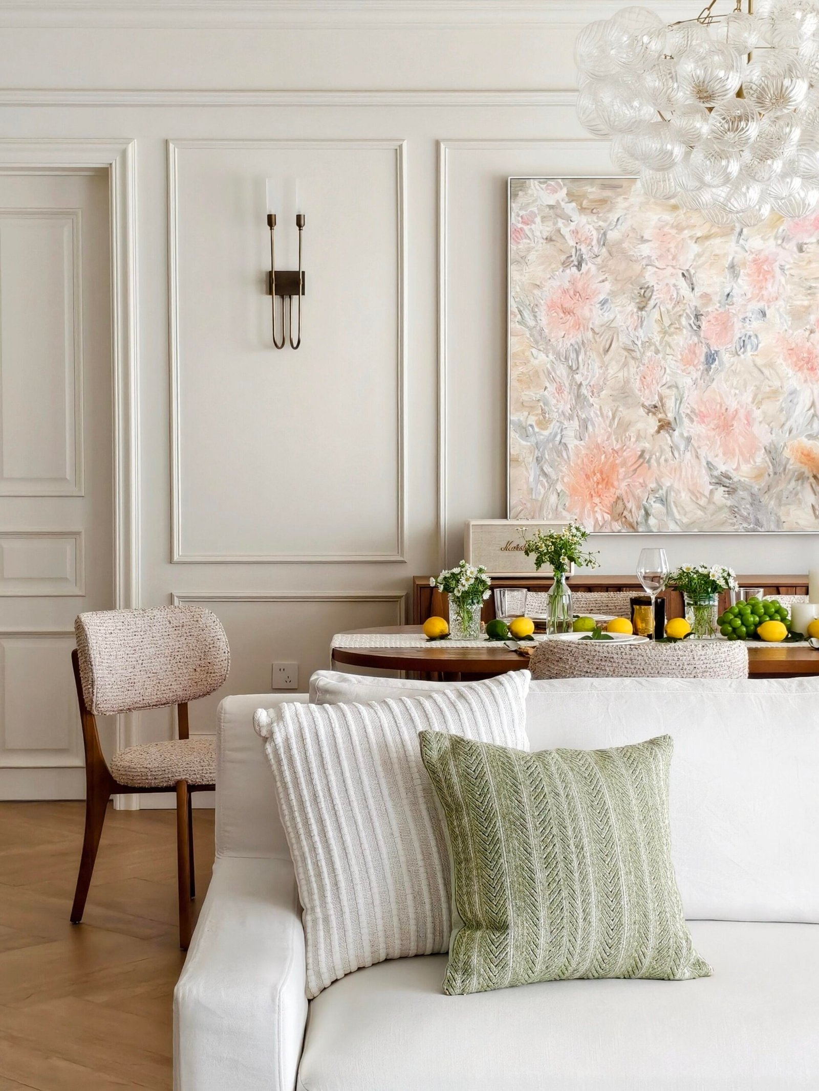 Dining table decor ideas repeated on a console styled with lemons and daisies